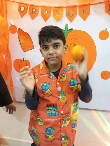 Child engaged in sensory exploration with materials