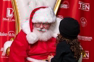 The Santa Cowboy listens to a childs special needs