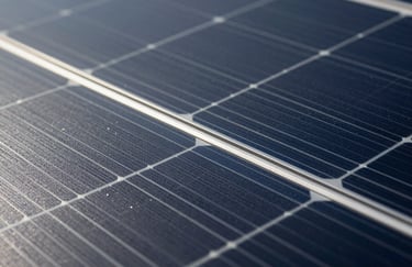 A macro shot of a high-efficiency solar panel surface, showing the geometric silicon patterns in deep midnight and steel blue.