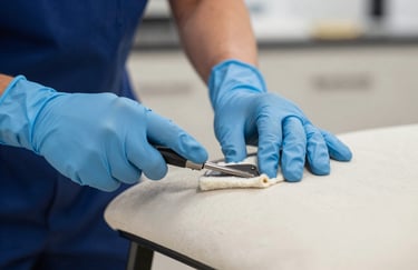 Detailed shot of gloved hands using a precision upholstery tool to deep-clean a designer chair. Focus on care and professional detail. Brand colors #1C3A3B and #EDF5F5 are integrated into the setting.