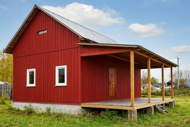 un chalet en bois avec bardage renove avec de la peinture suedoise rouge