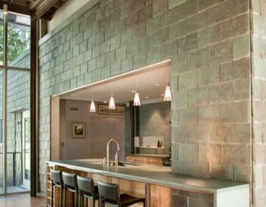 Manrise Enterprises - Modern kitchen with a natural stone wall design