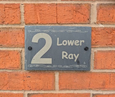 Bespoke engraved slate house sign by UK Woodpeckers