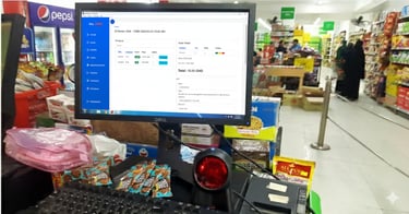 Point of sale system screen displaying inventory management software in a retail grocery store aisle.