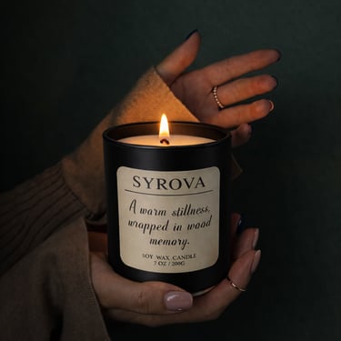 Close-up detail of elegant candle jar with refined label design