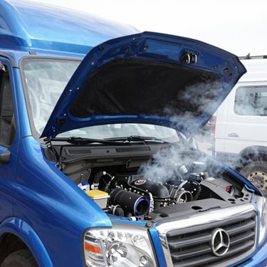 Close-up of a dirty fuel filter on a vehicle.