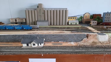 Grain silos in Kerr's Plain with Serenity station in the foreground.