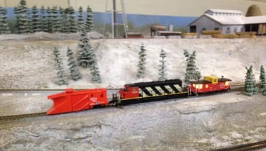 A CN plow train heads down the switchback branch on Moose Jaw