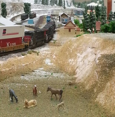 An intermodal train runs into Dog River on Moose Jaw