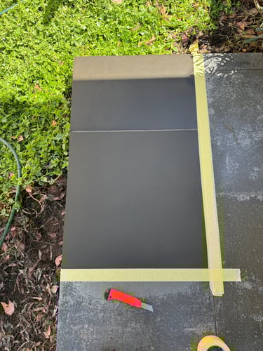 sealed section of bluestone tiled floor using color enhance sealer