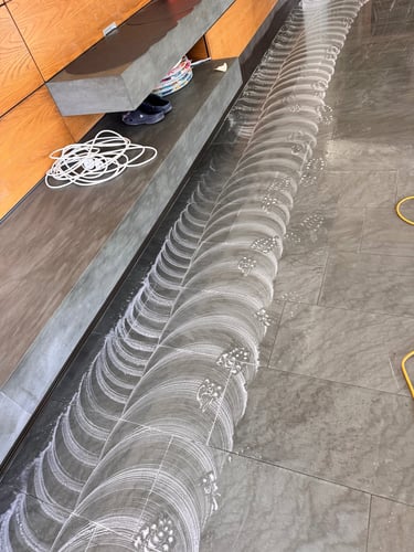 scrubbing tiled floor