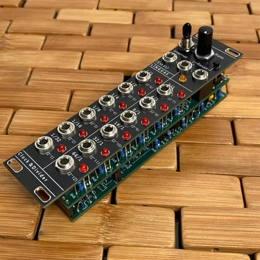 Clock and Divider Module by LinguaeDevices, for modular eurorack synthesizers. 