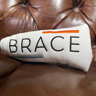 Brace forged golf putter head cover on leather