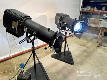 A pair of Rank Strand Patt. 765 CSI 1kW Followspot with 4-leaf Dowser on the front