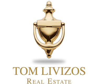 Tom Livizos Real Estate Co. logo