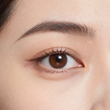 persons blue eyes in close up photography