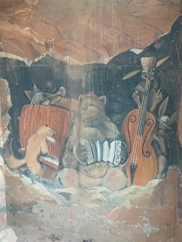 Rustic mural painting of forest animals playing musical instruments including a bear with an accordion.