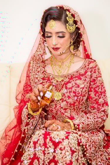 candid photo of asian bride getting ready, bride putting on perfume Chanel No 5  