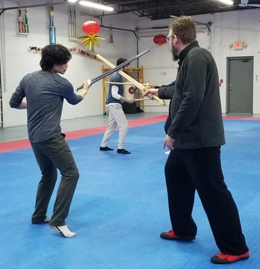 Student and instructor training easy side deflection with the Jian.