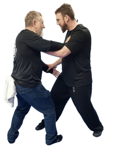 Chen Tai Chi instructor with student doing push hands (tui shou)