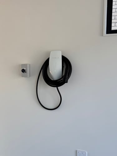 Smart Tesla Gen 3 Wall Connector installed in residential property
