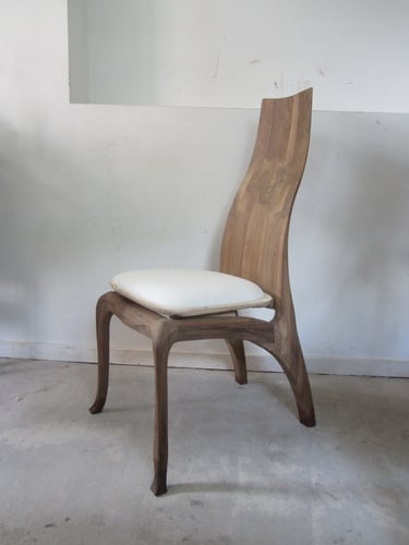 Modern dining chair with a new upholstered foam seat