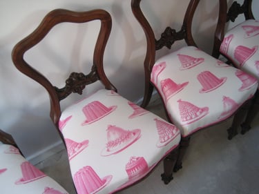 Victorian balloon back dining chairs with new upholstered seats. With pink and white cotton fabric featuring jelly and cake