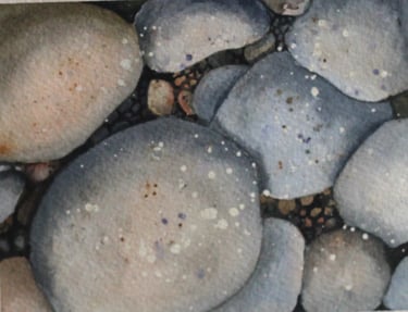 Watercolor of rocks on lakeshore