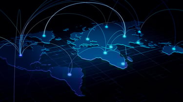 Digital blue world map showing global network connections and data communication lines across continents.