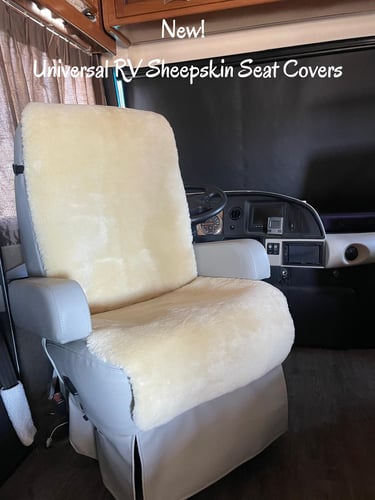 Plush cream universal sheepskin seat covers installed on a luxury RV captain's chair.