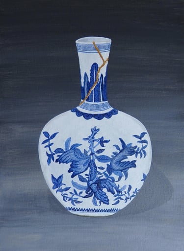 Blue and white vase with a gold leaf Kintsugi join