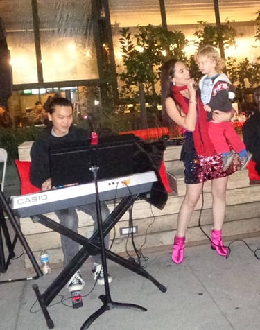 Rayssa Slater SAG Actor & Musician - photo of live performance with child 