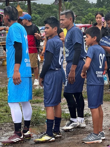 Roger Bardales and his son waiting before soccer match