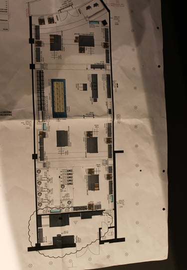Detailed architectural floor plan drawing showing room layouts, furniture placement, and dimensions.