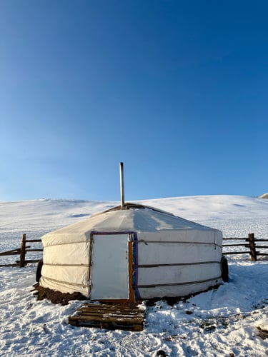 Nomadic winter ger on the snowy Mongolian steppe
