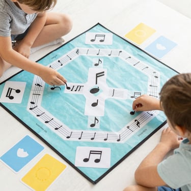 person playing black and white piano