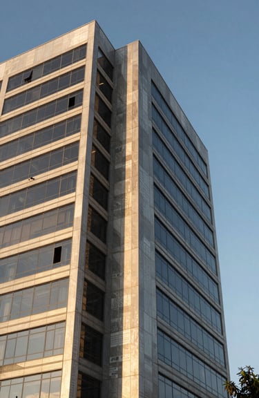Architectural detail of a modern corporate building in the Caieiras region during golden hour.