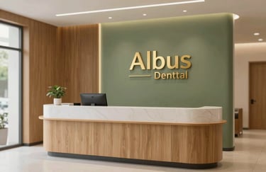 Interior shot of the newly renovated Albus Dental clinic reception, featuring warm wooden textures, olive green walls, and golden logo detailing.