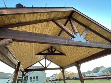 Wood Patio with Large Beams and Sloped Ceiling
