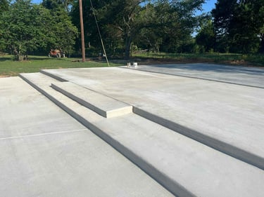 Fresh concrete foundation with steps.