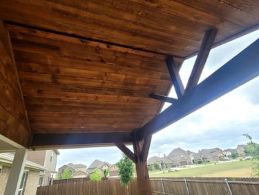 Close-up view of wooden gable patio roof.