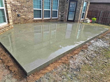 Freshly poured concrete patio.