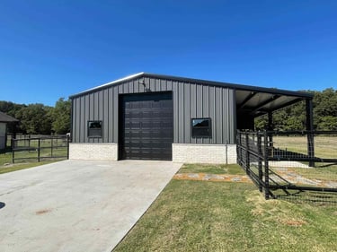 Metal Shop with Black Fence.