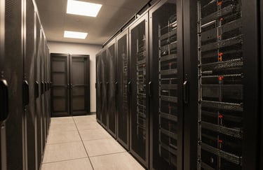 A clean, high-tech server room in a North American facility with soft amber lighting, representing stable and reliable digital infrastructure.