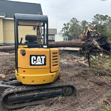 Excavation equipment clearing land in Holly Ridge NC