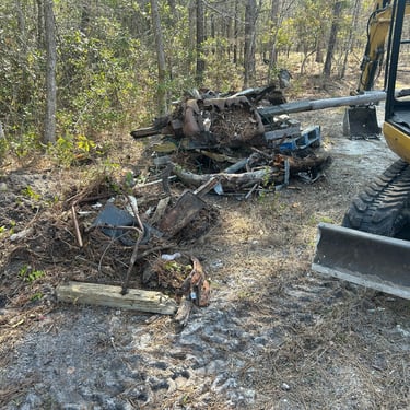 Excavation equipment clearing land in Holly Ridge NC