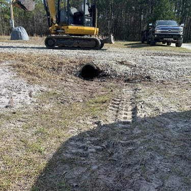 Excavation equipment clearing land in Holly Ridge NC