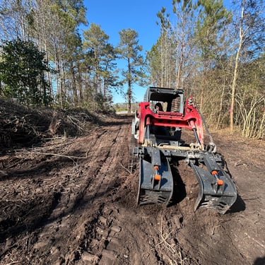 Excavation equipment clearing land in Holly Ridge NC
