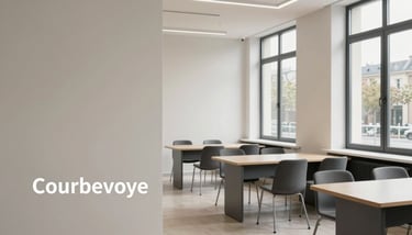 A student writing diligently in a modern classroom in Courbevoie, soft natural light, professional European / French setting.