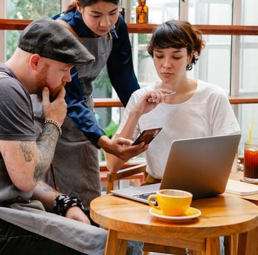 Photo by Tim Douglas : https://www.pexels.com/photo/diverse-colleagues-with-smartphone-and-laptop-sp